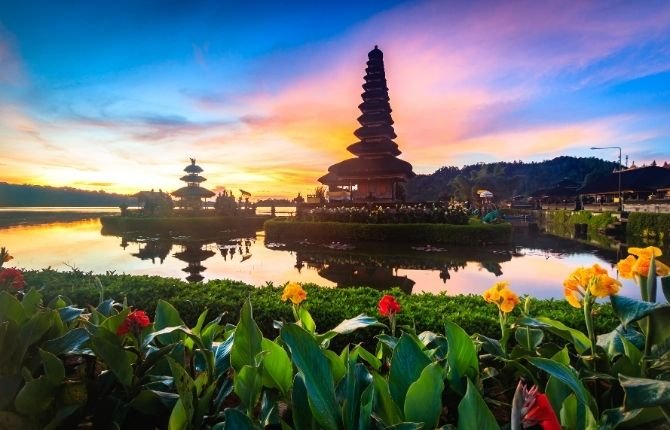 Ulun Danu Beratan temple reflected in the lake at sunset in Bali